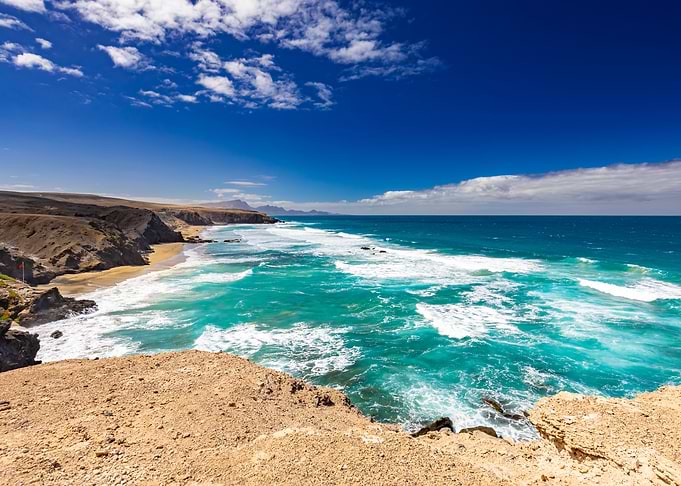 Rugged Coastline with Turquoise Ocean Waves
