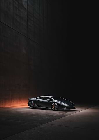 Dark Lamborghini in Industrial Setting