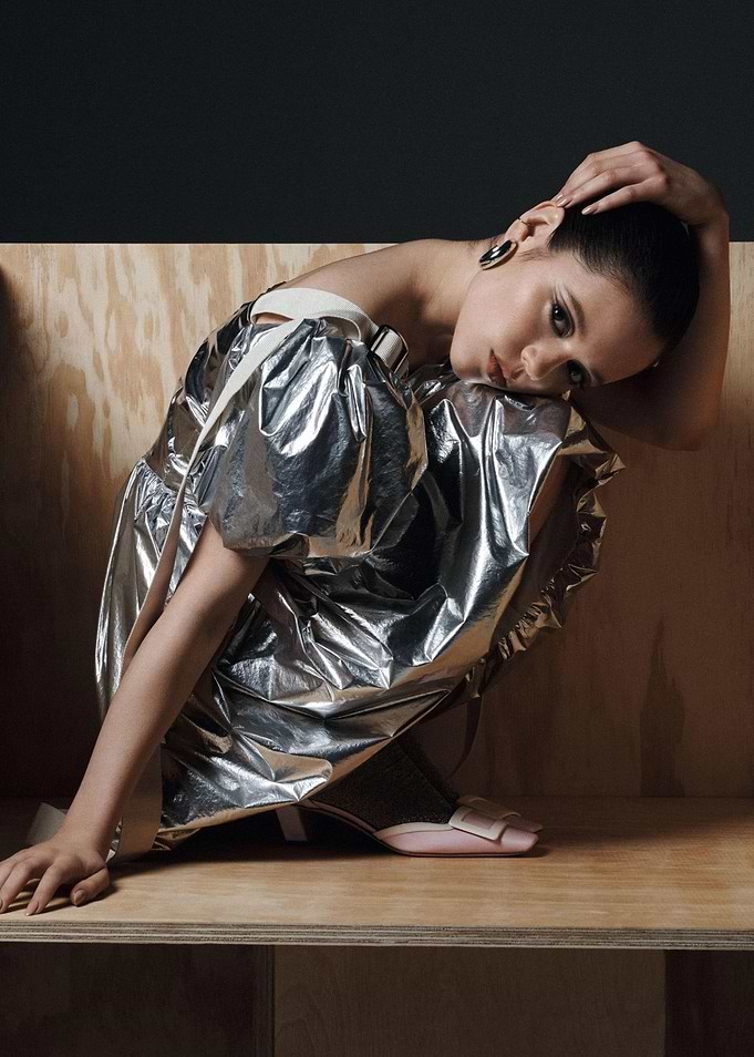 Model in Metallic Dress Posing