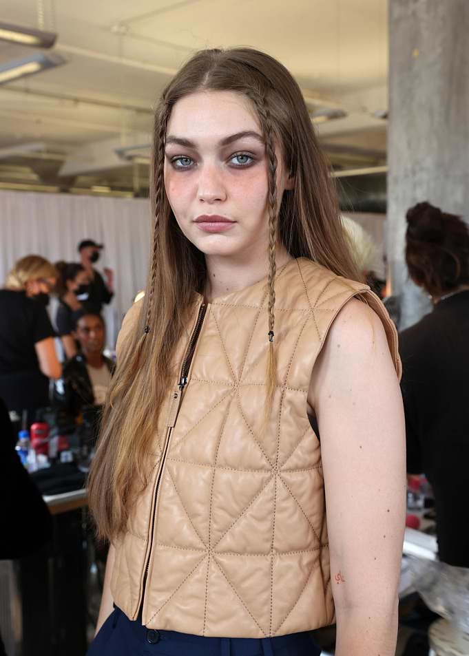 Model with braided hair and makeup