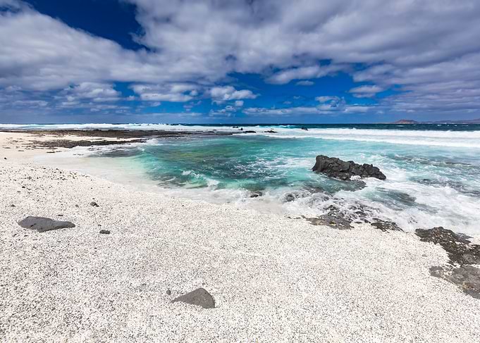 Tropical Beach with Turquoise Water and White Sand