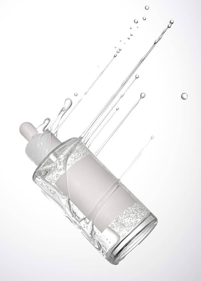 Cosmetic serum bottle with splash