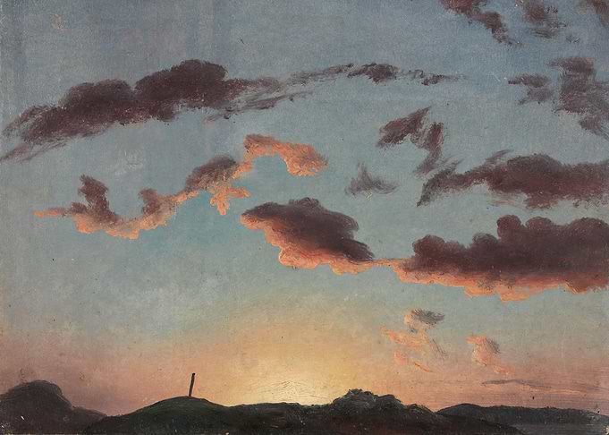 Sunset over rolling hills