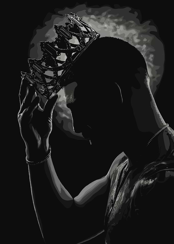 Man with Crown in Dramatic Lighting