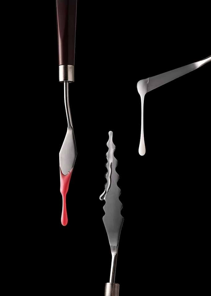 Art palette knives with paint drips