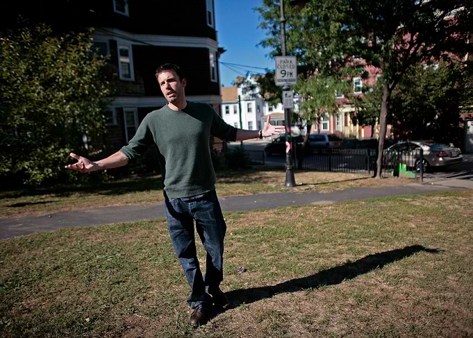 Man gesturing in a park