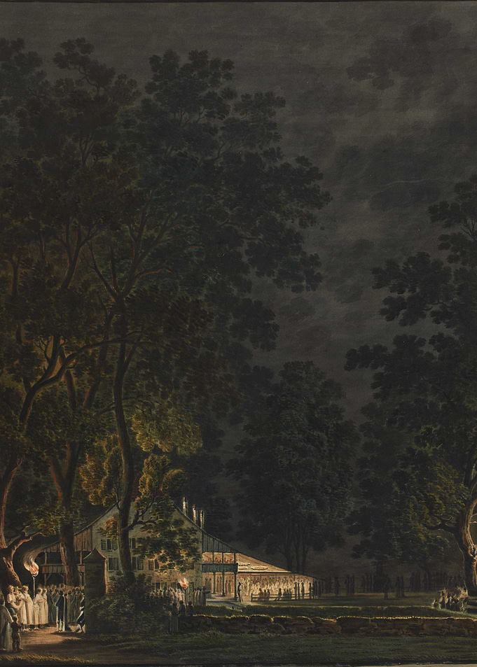 Nighttime Gathering at a Lit Building