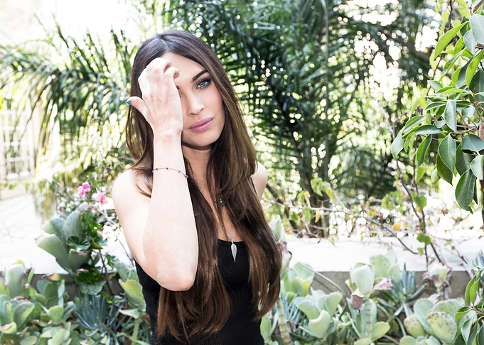 Megan Fox in a garden setting