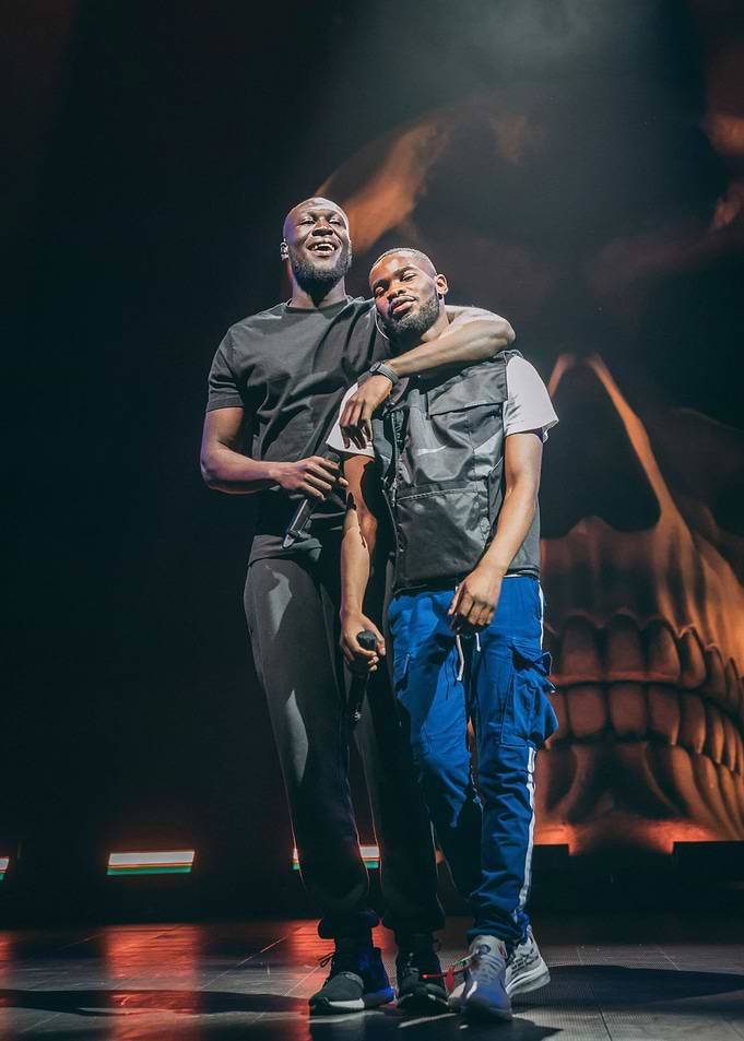 Two male musicians on stage