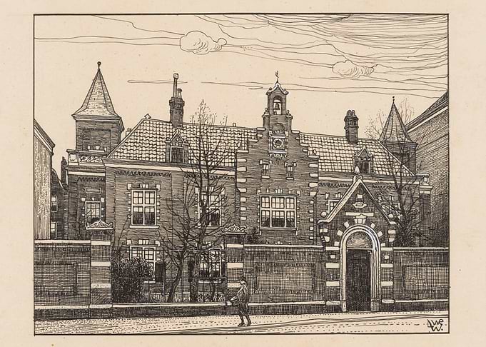 Ornate Brick Building with Tower and Gate