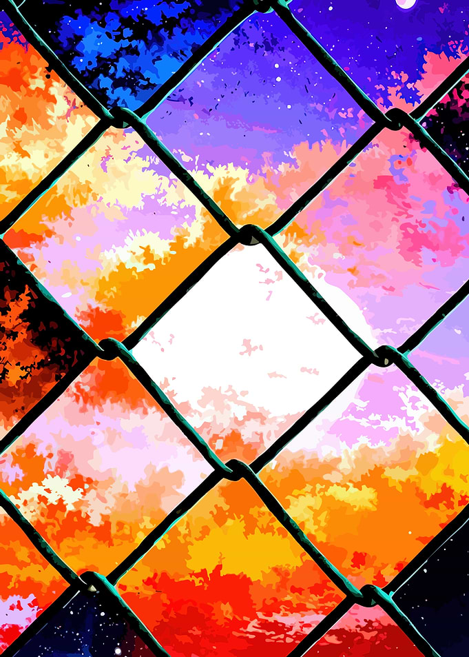 Vibrant Sunset Sky Behind Chain Link Fence