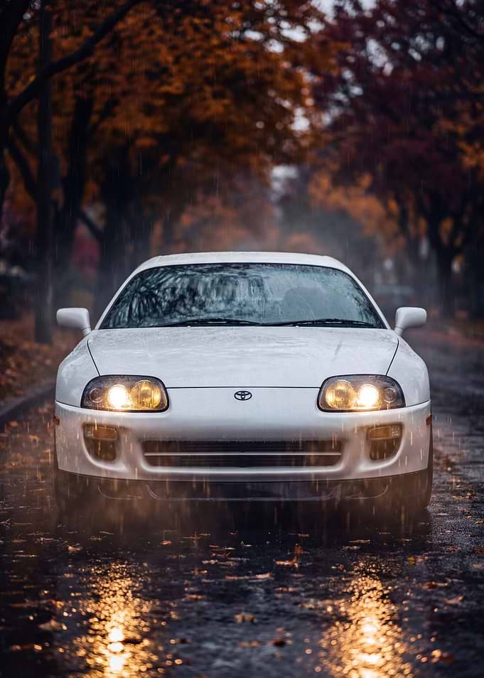 White Toyota Supra Mk4 in the Rain