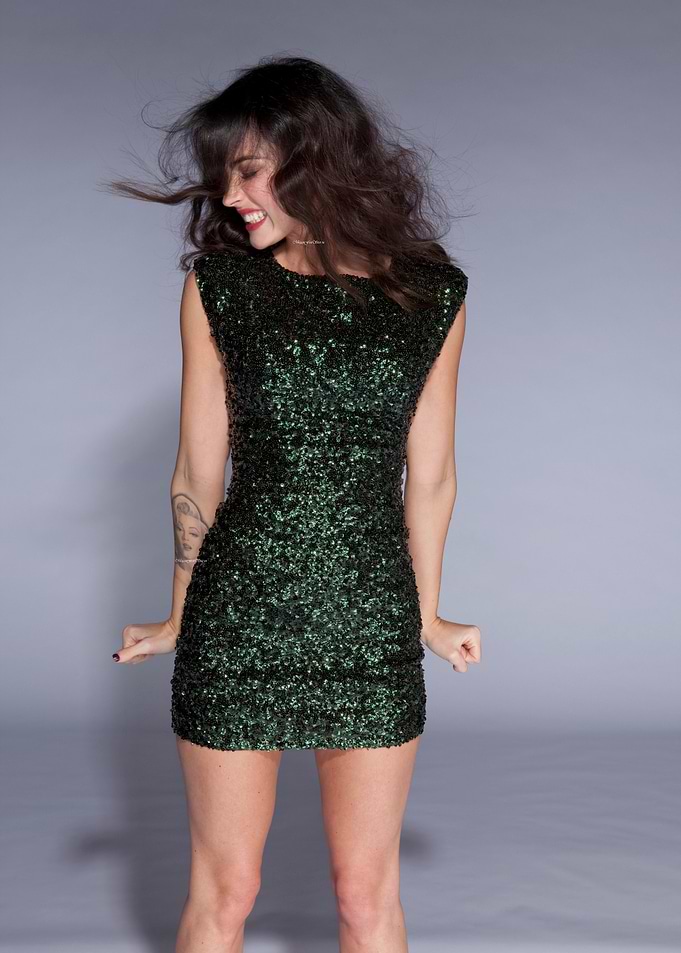 Woman in Green Sequin Dress Dancing