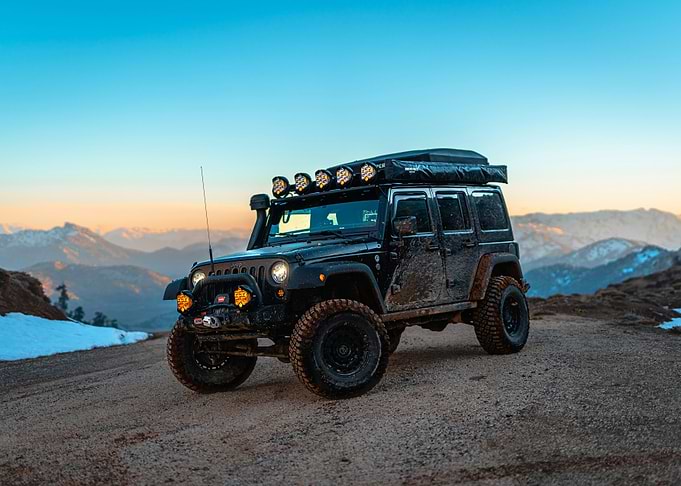 Off-road Jeep in Mountain Landscape