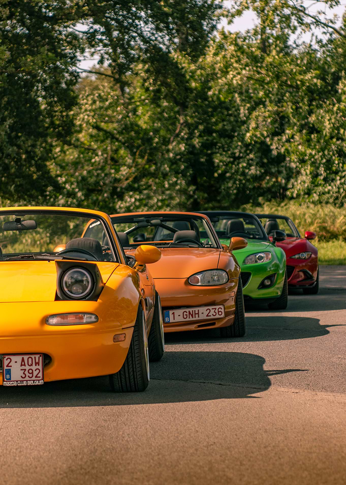 Line of colorful Mazda MX-5 convertibles