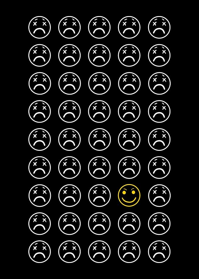 Happy Face Among Sad Faces