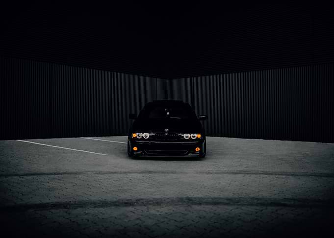 Black BMW E39 M5 in Dark Garage