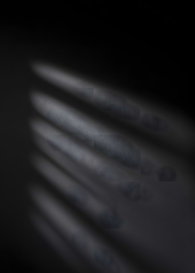 Dark Textured Wall with Light Streaks