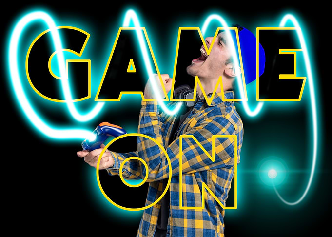 Gamer with 'Game On' text