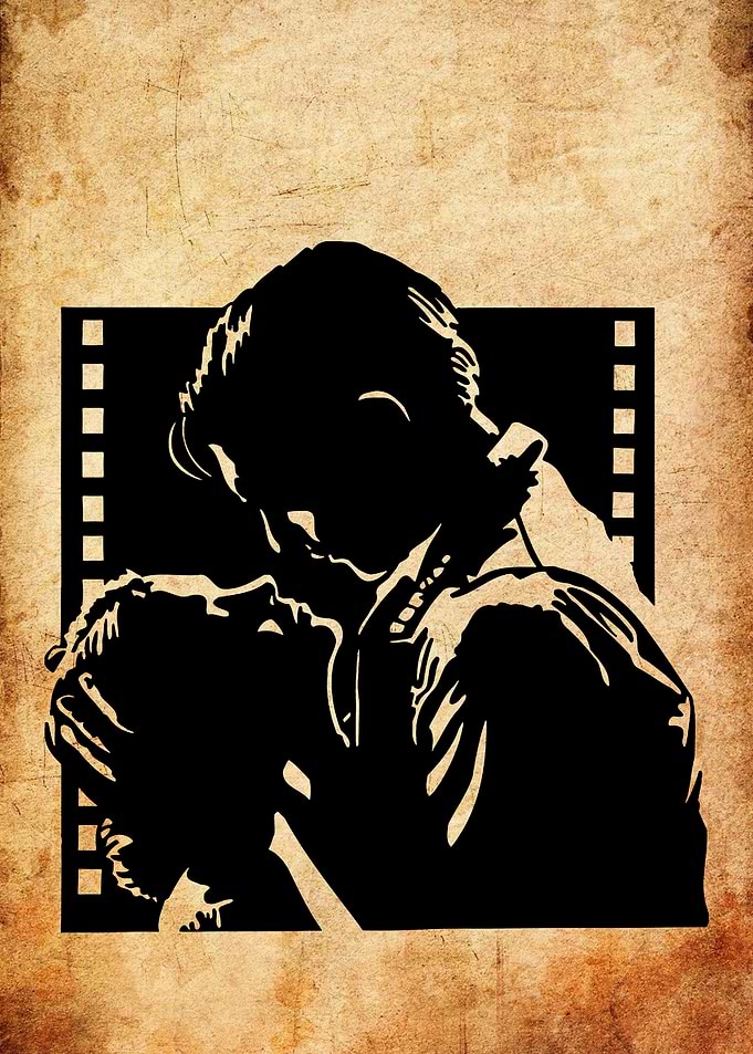 Silhouette of a Couple Kissing