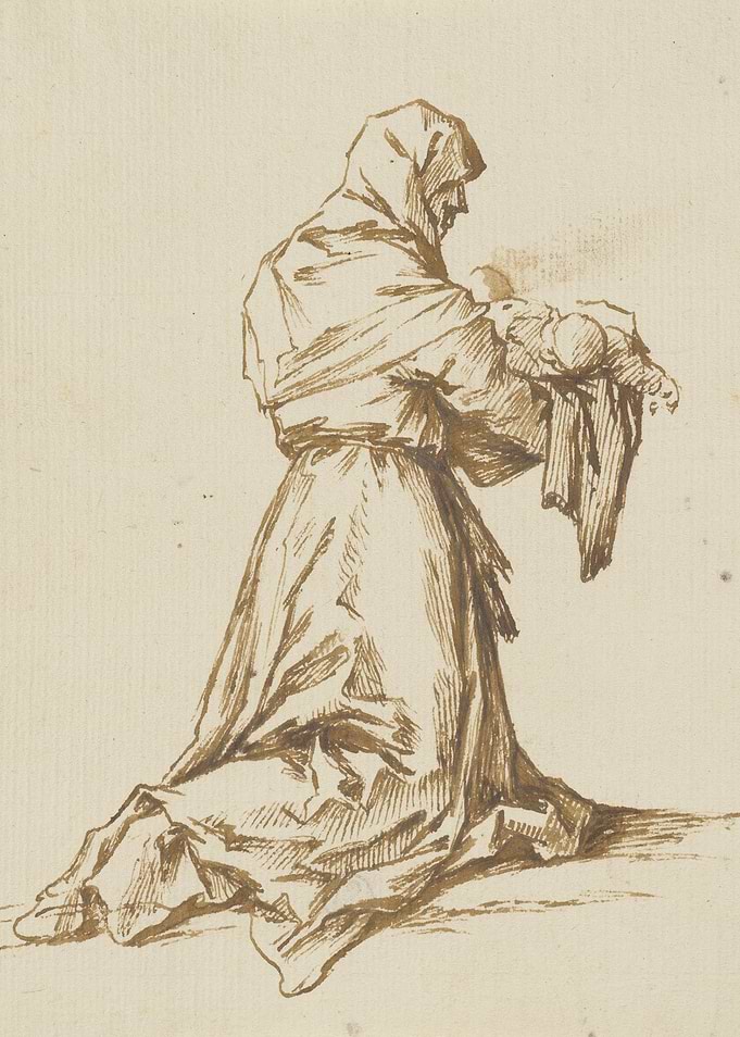 Monk holding a baby