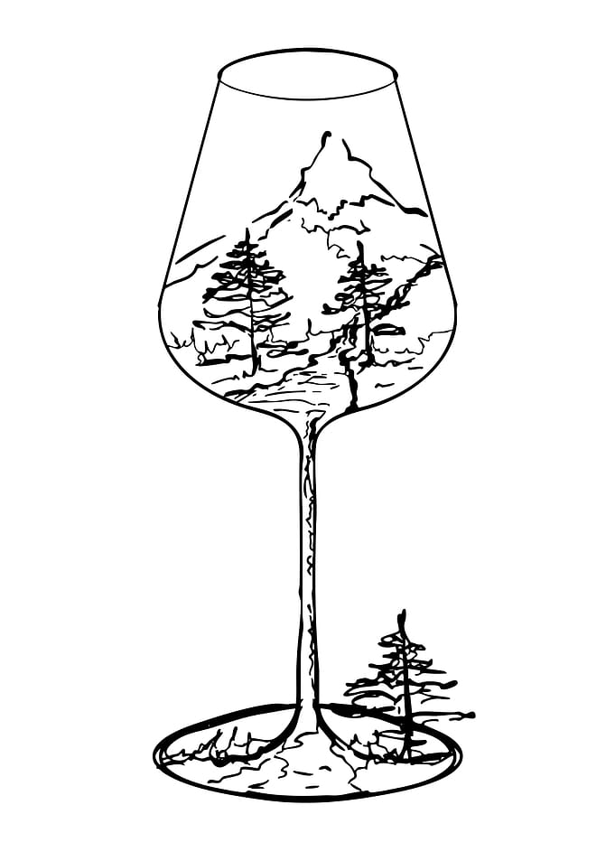 Wine glass with mountain landscape
