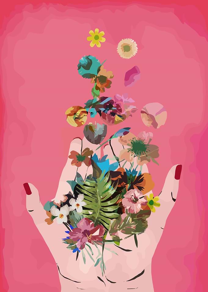 Hands holding falling flowers