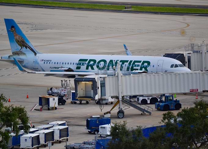 Frontier Airlines plane at gate