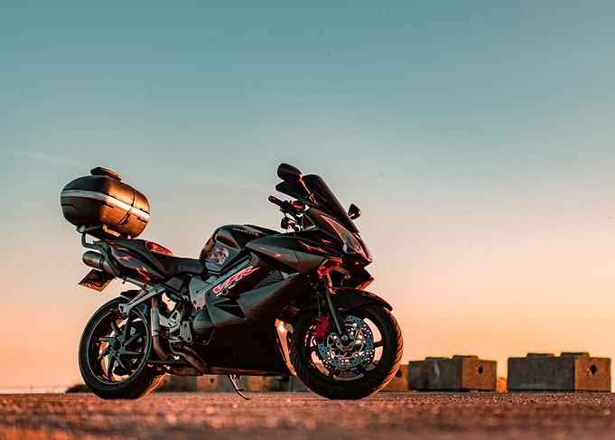 Black Honda VFR Motorcycle at Sunset