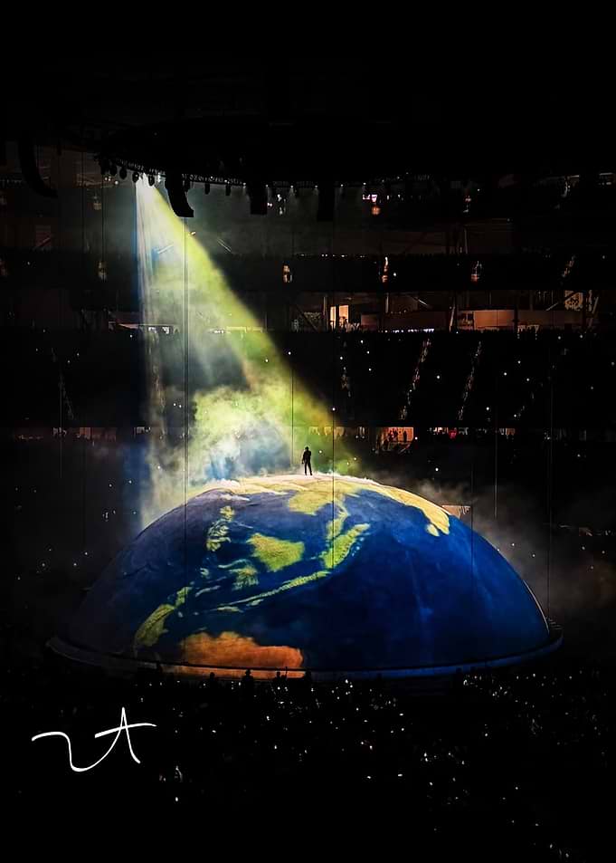 Artist on a Globe Stage