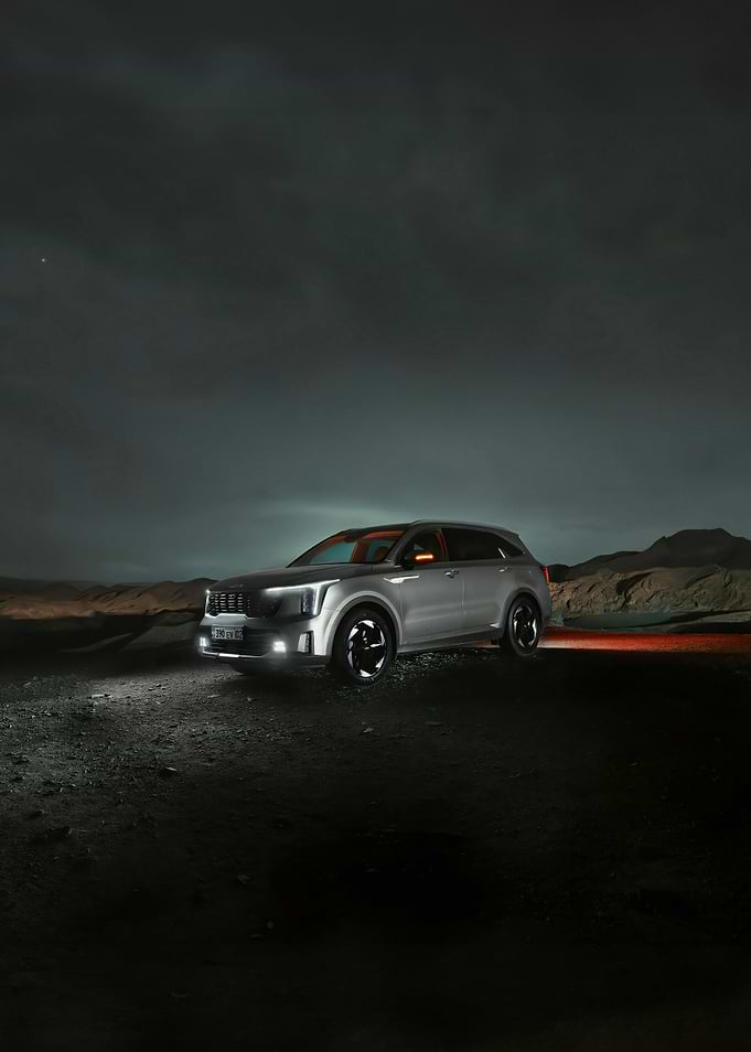 Silver SUV at Night in Desert