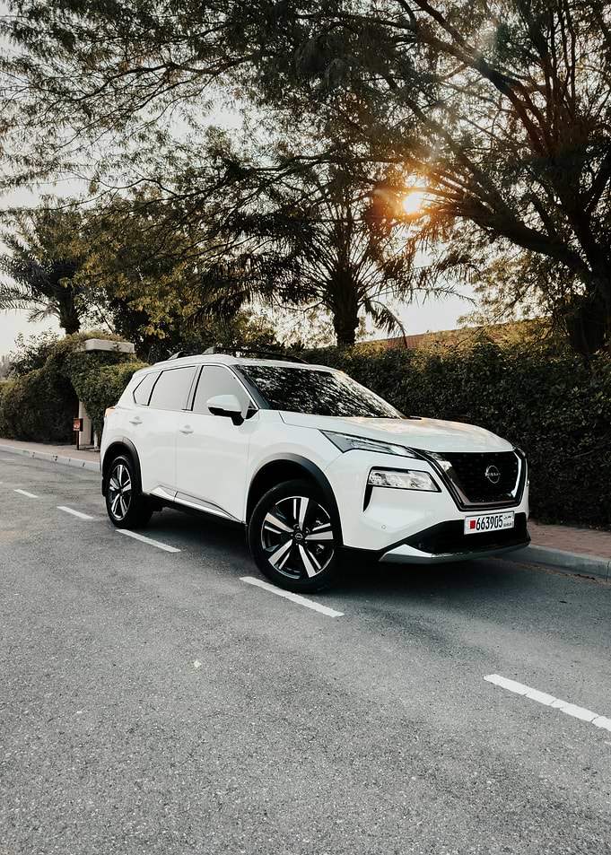 White Nissan X-Trail on a Road