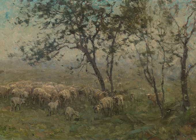 Sheep grazing in a misty landscape