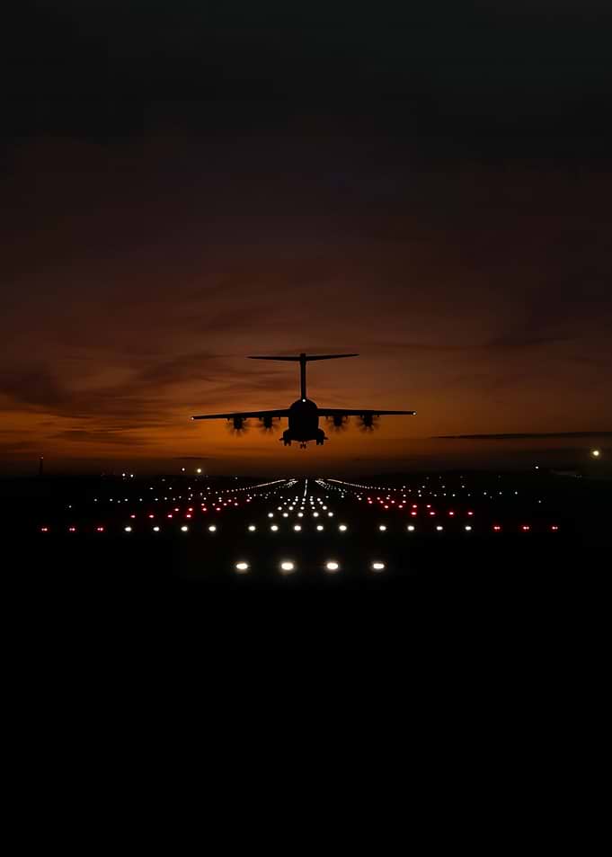 Airplane Landing at Dusk