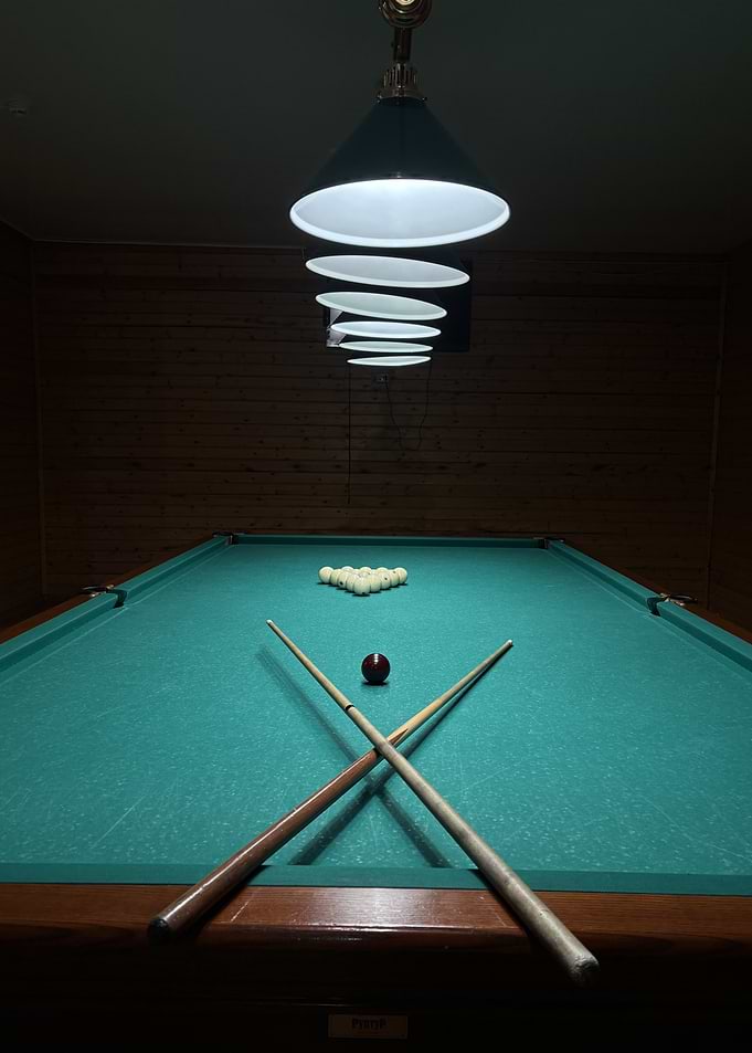 Billiard Table with Balls and Cues