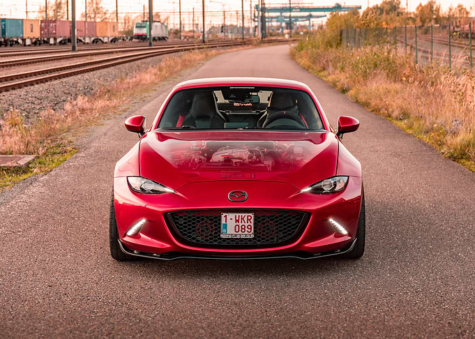 Red Mazda MX-5 Miata on Road