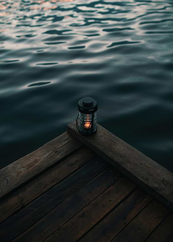 Lantern on a Dock by the Water