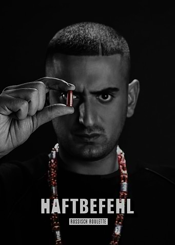 Man holding a bullet