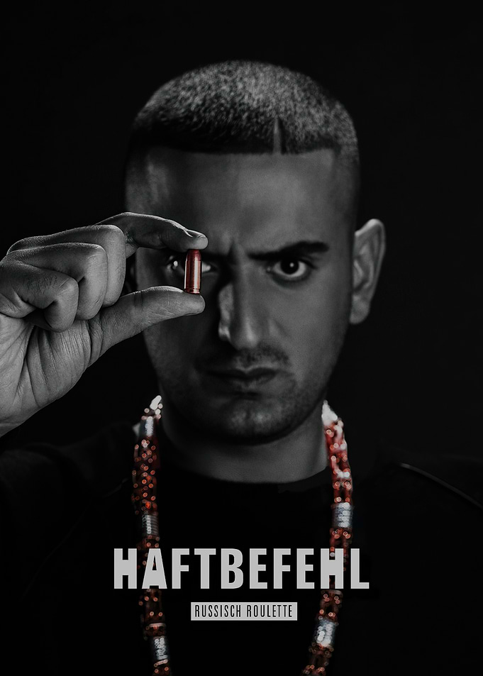 Man holding a bullet