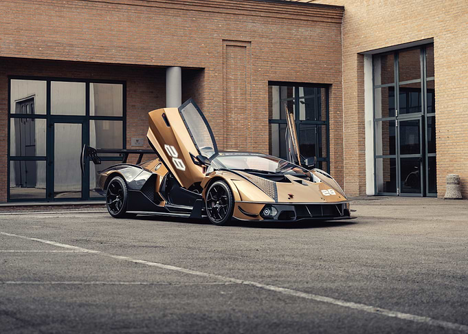Gold and Black lamborghini essenza with Doors Open