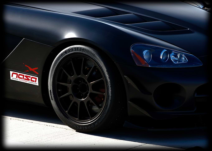 Matte Black Sports Car with NASA Decal