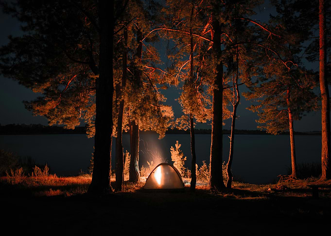 Camping by the lake at night