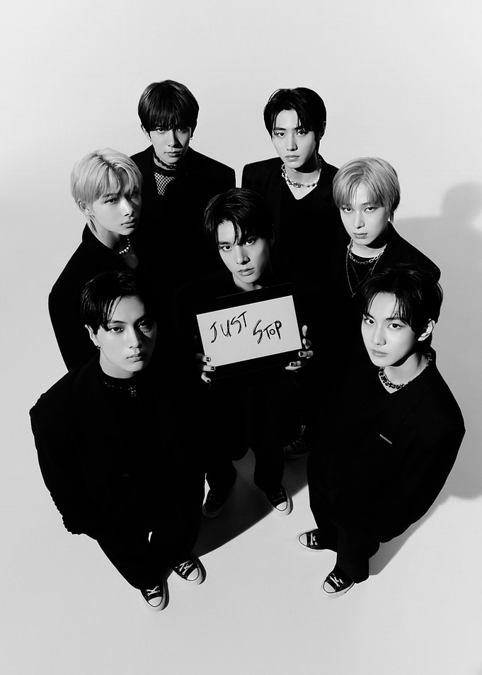 K-Pop Group Poses in Black Outfits