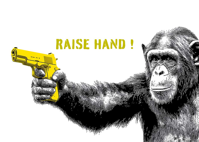 Chimpanzee holding a yellow gun