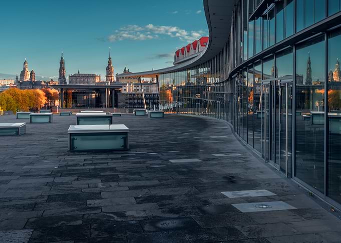 Modern Architecture Reflecting City Skyline
