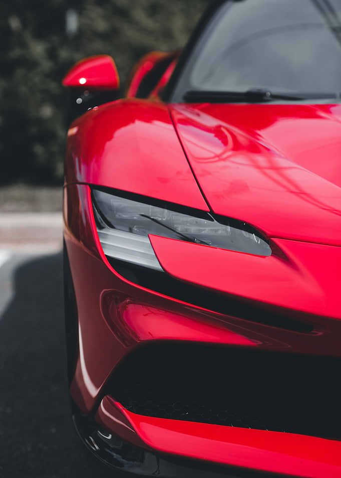 Red Sports Car Headlight Close-up