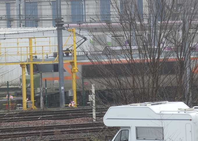 Train and RV in industrial setting