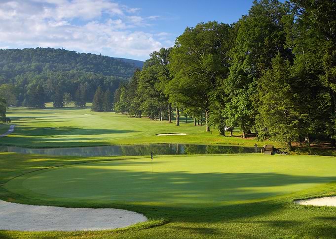 Golf Course Green with Pond and Trees