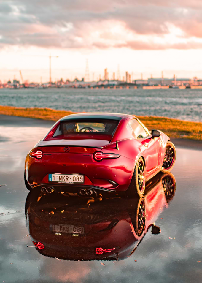 Red Mazda MX-5 Miata on Wet Road