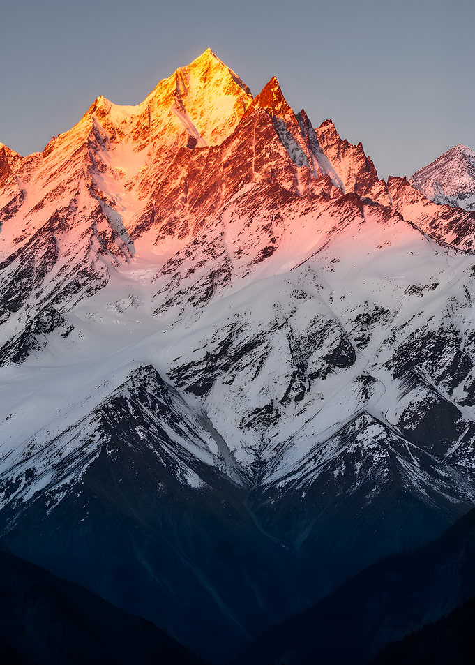 Sunrise on Snow-Capped Mountains